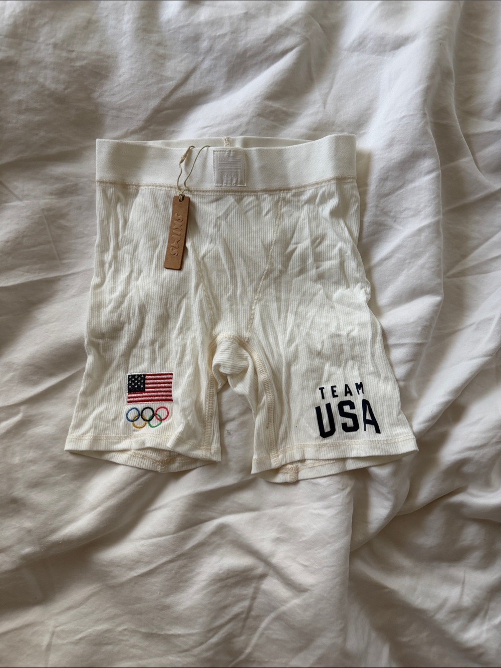 SKIMS Cream Ribbed Team USA Athletic Shorts with Flag and Olympic Rings